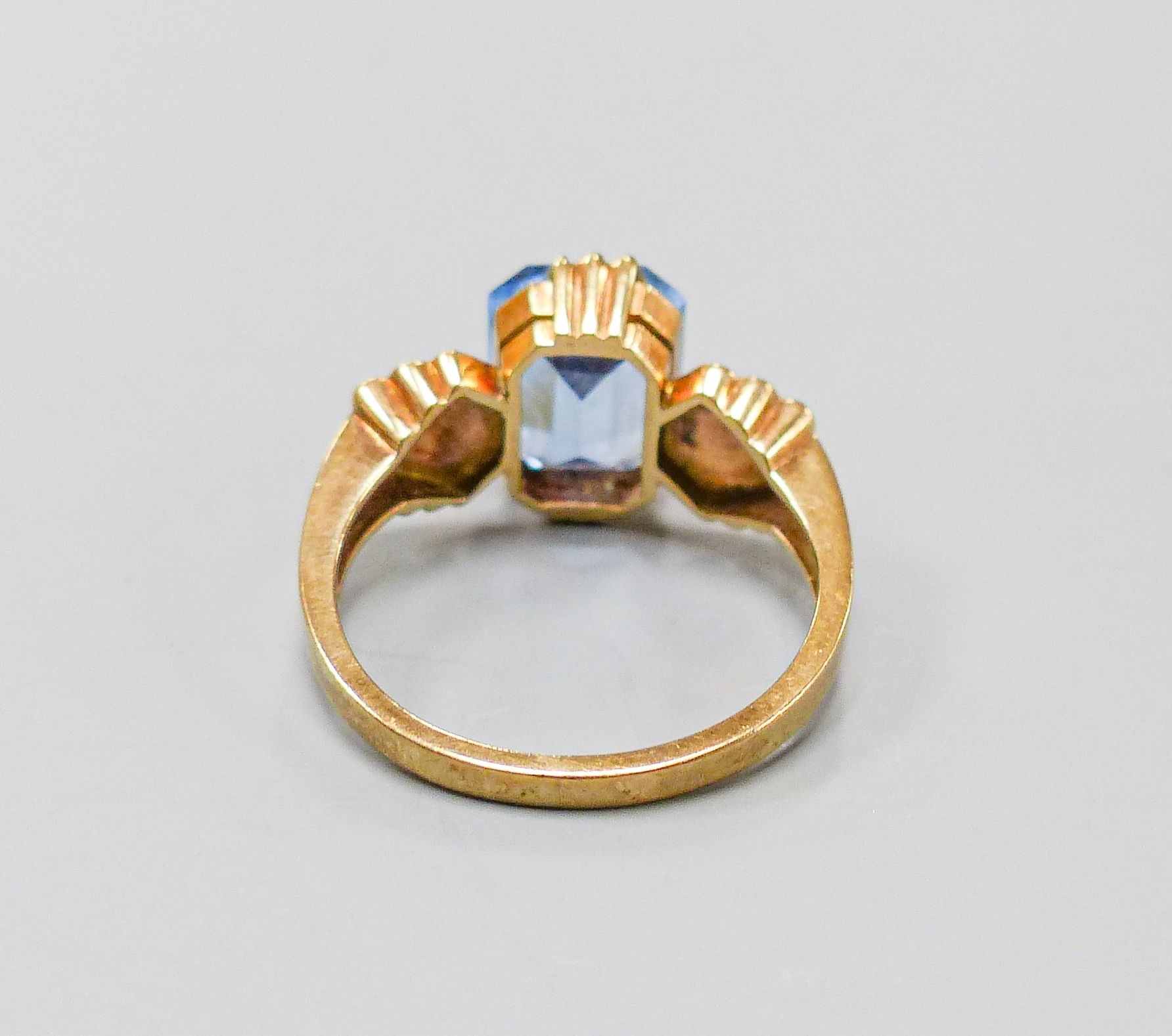 A 9ct and blue paste set dress ring, size O, gross weight 3.8 grams.